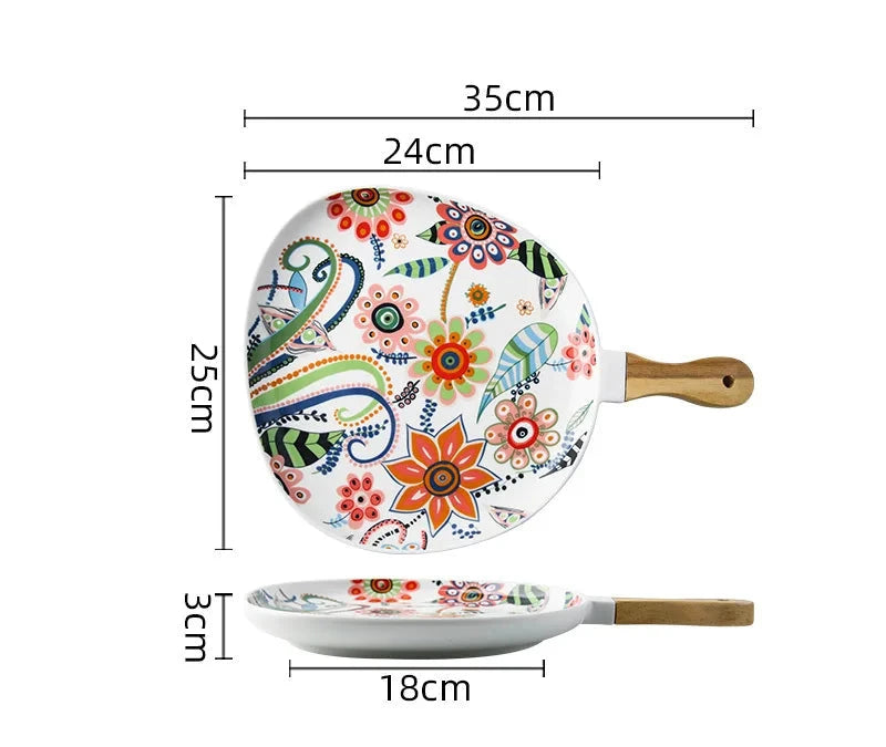 Colorful frying pan with floral design and measurements on a white background