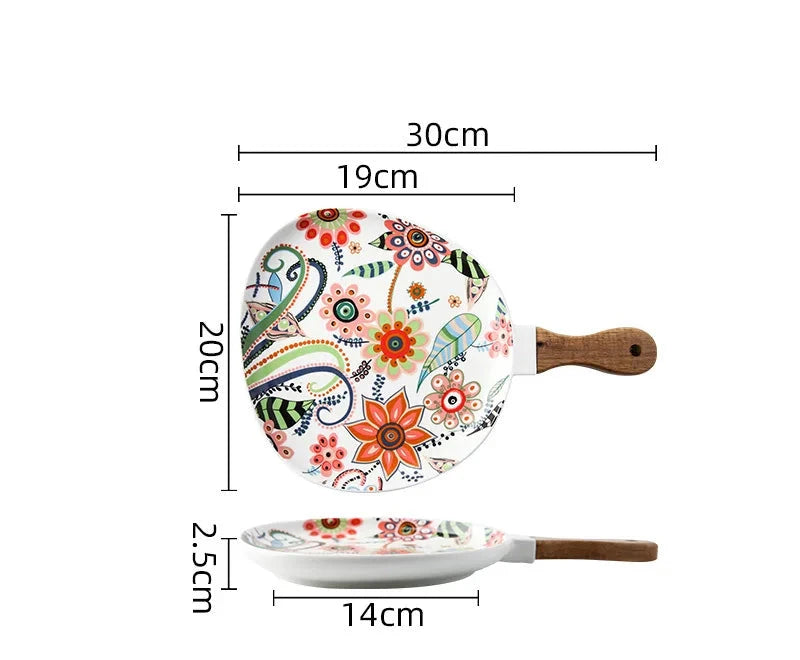 Colorful ceramic plate with floral design and wooden handle, shown with measurements on a white background.